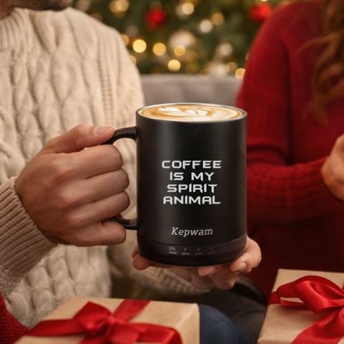Smart mug engraved with Coffee Is My Spirit Animal held at holiday celebration