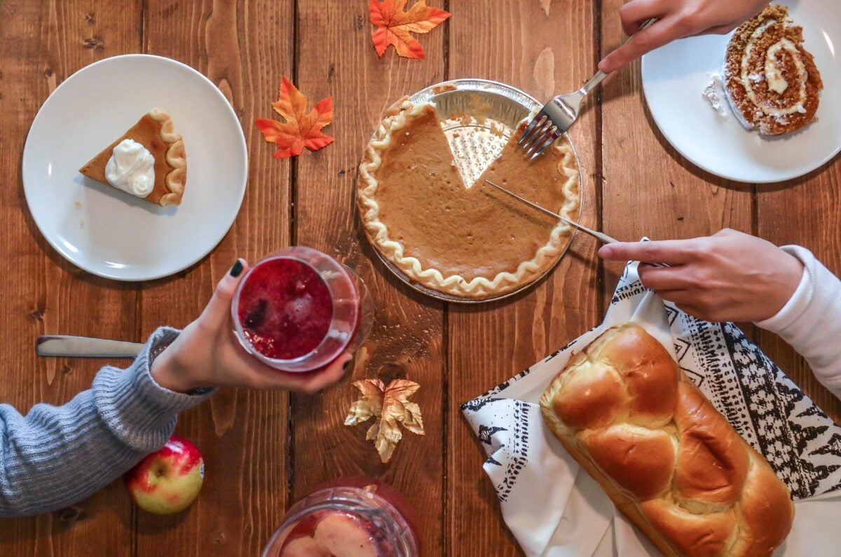 topdown picture of a Family eating pumpkin pie together