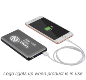 phone plugged into engraved power bank