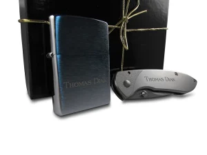 Black gift box with engraved pocket knife and engraved zippo